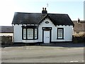 Tollhouse by the A595, Bransty Road, Parton