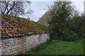 Verge, with pantiled outhouse