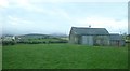 Field barns overlooking the A25 on the eastern outskirts of Kilcoo