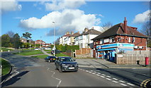 SE2439 : Tinshill Lane passing the Mace shop, Cookridge by Humphrey Bolton