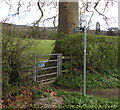 Public footpath direction sign alongside the B4632 in Prestbury