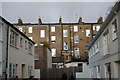 View of the rear of buildings on Fulham Road from Elm Park Lane