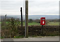 Elizabeth II postbox beside footpath on Marple Road, Chisworth