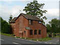 Old Toll House by the B4203 at Sandy Cross