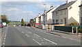 Houses alongside the A27 at Carnbane Gardens