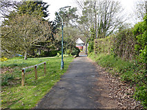 TQ3006 : Path leading away from St Peter's Preston church by Robin Webster