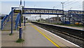 SU4866 : Newbury Racecourse railway station footbridge by Jaggery