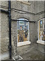 TL8783 : Artworks in the "windows" of Thetford Guildhall by Adrian S Pye