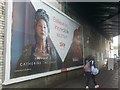 Advertising hoarding under the Finchley Road railway bridge