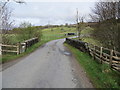 Road (B846) and bridge crossing Killichonan Burn