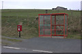 Postbox and bus shelter by the Cauldhame Road