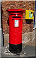 Elizabeth II postbox and defibrillator on High Street, Farndon