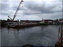 C8540 : Barge moored in Portrush Harbour by Willie Duffin