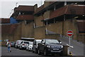 View of the ramp coming down from the multi-storey car park for the Blenheim Shopping Centre from Evelina Road