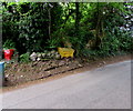 Yellow salt/grit bin above Llangrove Road, Trewen, Herefordshire