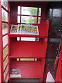 Inside a former red phonebox, Oldbury-on-Severn 