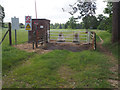 TL8394 : Barred MOD entrance with Guard post and Cattle Grid by David Pashley