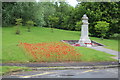 Remembrance - war memorial and bed of poppies