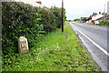 Milestone on south side of A689 in Crosbymoor