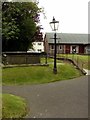 Former gas lamp. Castle Donington churchyard