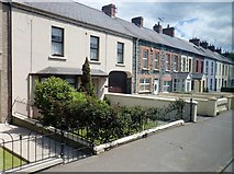 J3652 : Terraced housing on the A24 (Belfast Road) at Ballynahinch by Eric Jones