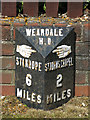 Milepost on the A689 at the east end of Westgate