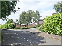 J0608 : The entrance into the Ath Lethan Housing Estate from Racecourse Road by Eric Jones