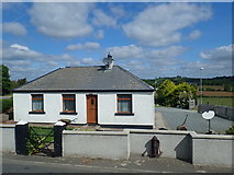 J2933 : Bungalow at the eastern outskirts of Kilcoo by Eric Jones