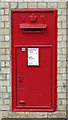 Large Victorian postbox, Woodside Park tube station entrance building