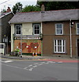 Boarded-up Riverside Health shop in Adpar, Ceredigion