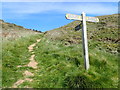 Footpath signpost on the Wales Coast Path