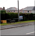 Yellow box and wooden bench near a hall, Llwyn Helyg, Tredegar