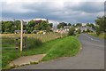 NY8892 : Roadside path to Otterburn by Jim Barton