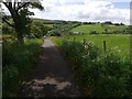 NY6665 : Cycle Path that ascends from Greenhead by Clive Nicholson