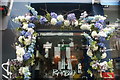 View of flowers above the door of the Rambla bar on Dean Street