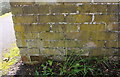 Benchmark on electricity substation on south side of Shire Road