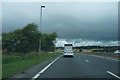 Heavy clouds over the road