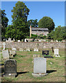 Littlebury churchyard and Flint Cottage