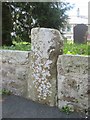 Inscribed upright stone in wall at St Aelhaearn