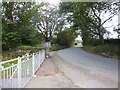 St Dogwells: looking from the church gates towards the road to the farm