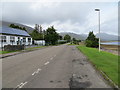 Road (A896) beside Loch Carron at Lochcarron Primary School