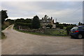 Cottage and farm by The Ridings, Stonesfield