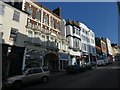 Shops, businesses and flats with assorted facades, Fore Street, Exeter