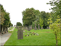 SE2028 : St Paul, Birkenshaw - churchyard by Stephen Craven