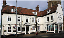 TF4576 : The George Inn 13-14 High Street Alford by Jo and Steve Turner