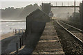 SX9676 : Trackside building and footbridge, Dawlish by Derek Harper