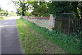 Bridge parapet and dry stone wall on south side of Harston Road