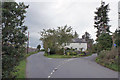 Road junction and cottage