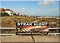 Sign at Pevensey Bay looking east-northeast