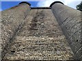 NZ1225 : Brick pier of former railway viaduct by David Robinson
